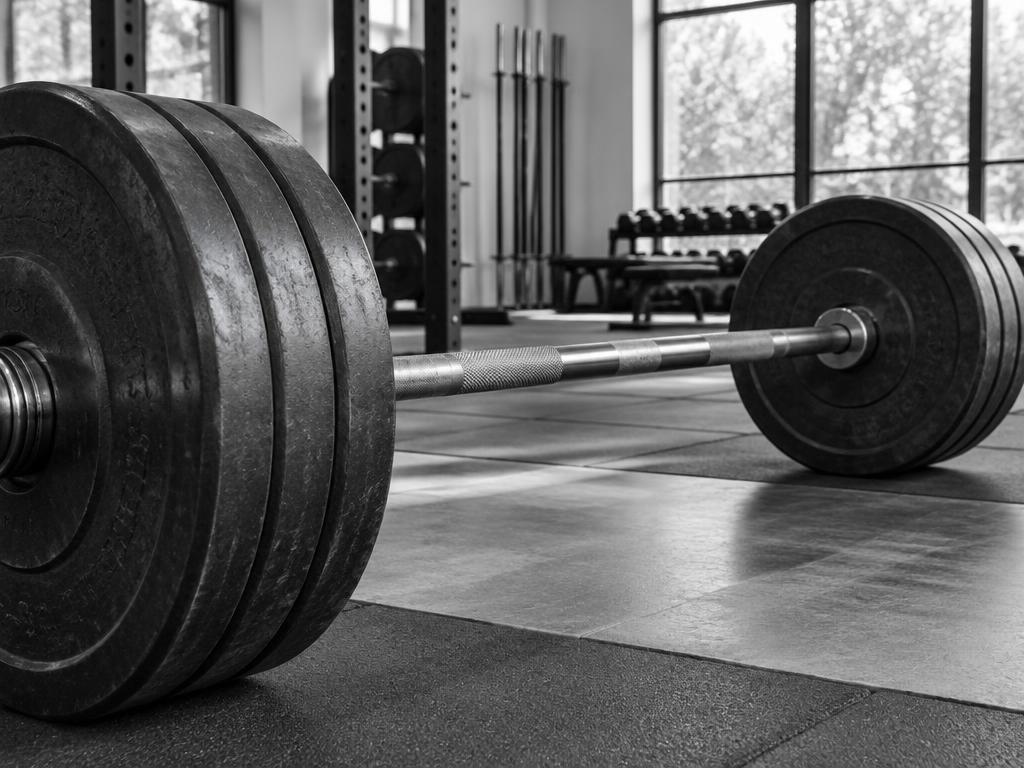 Barbell and strength training equipment — Illustrative editorial image